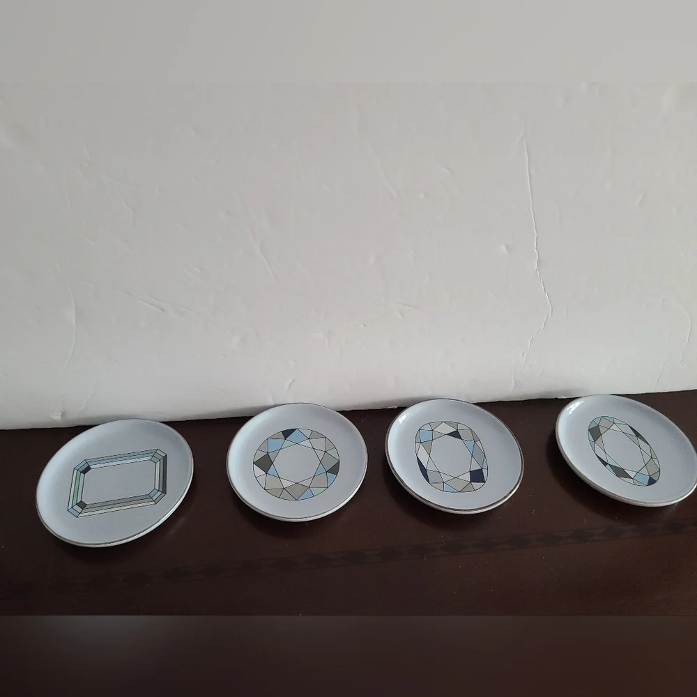 Kwiat jewelry set of 4 ceramic display plates
